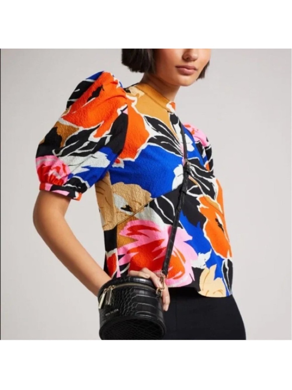 Ted Baker "Azura" blouse in a vibrant floral print and puff sleeves. Size 4 NWOT